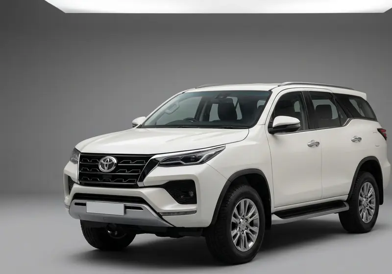 White Toyota Fortuner luxury 7-seater SUV for car rental in Ahmedabad