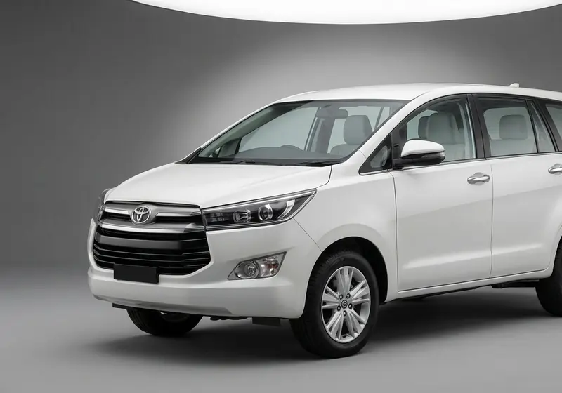 White Toyota Innova Crysta premium 7-seater MPV for car rental in Ahmedabad